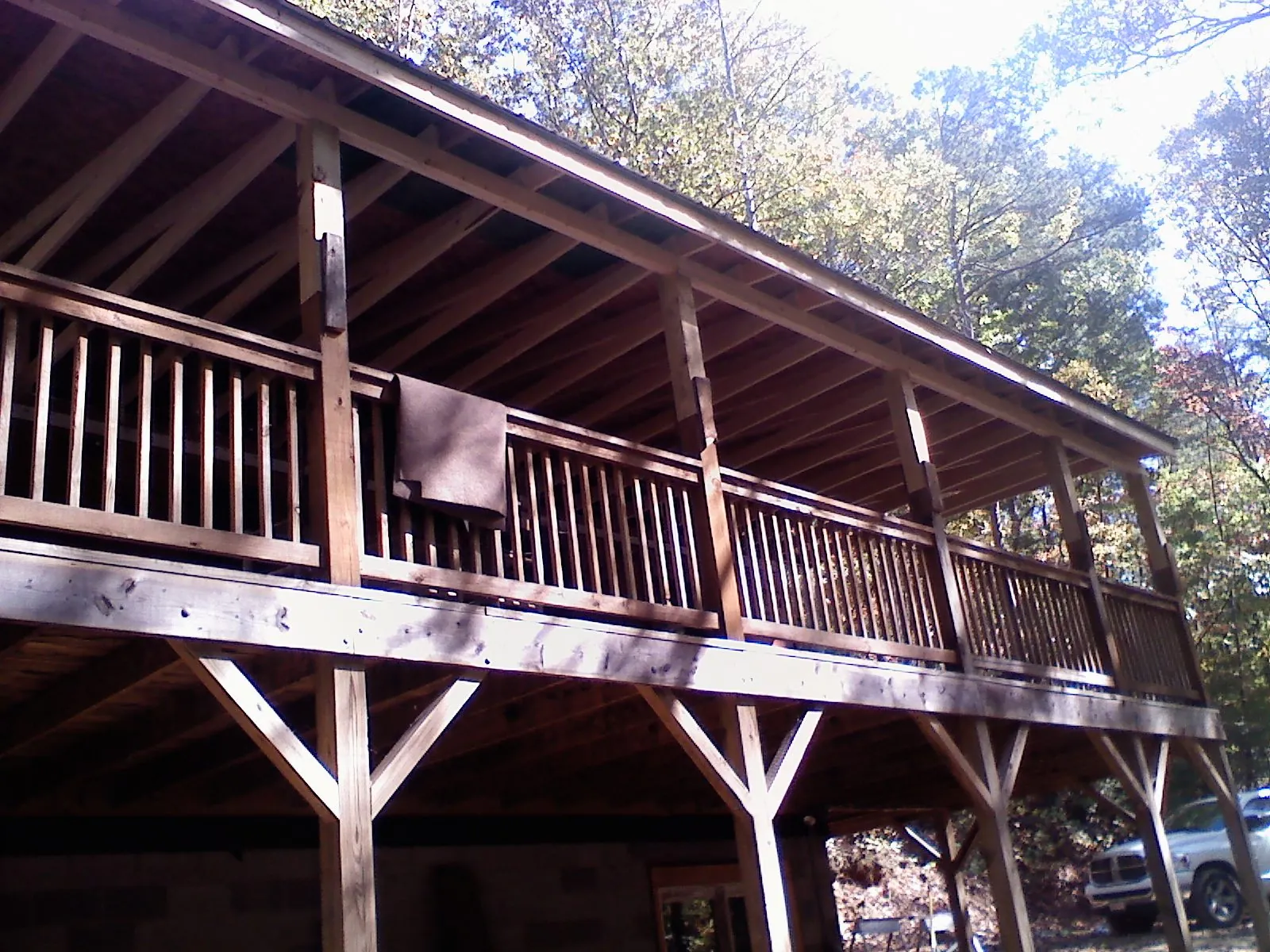 Timber framing under a new elevated porch and deck — Roof Leak Repair in Longboat Key by Roofing Brothers
